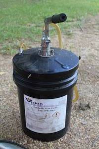 lot 107 image: Vision Premium Products Synthetic Gear Lube Tank