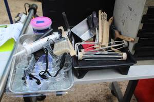lot 135 image: Paint Supplies - Rollers, Pans, Brushes, Goggles, Stir Sticks, Spackling, Respirator Masks