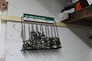 lot 513 image: Wall-Mount Hose Clamp Display Rack with Hose Clamps