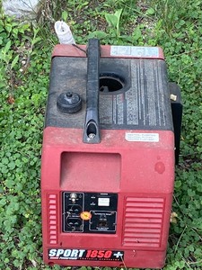 lot 62 image: Coleman Powermate Generator