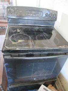 GE electric glass top stove with 4 ...