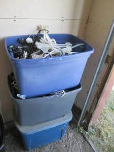 3 totes, 2 full of hangers and 1 ha...