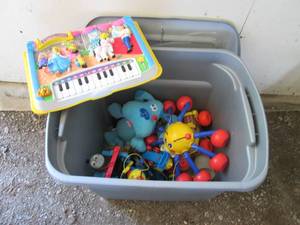 Tote with childrens toys including...