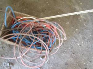 Box with 3 extension cords, yard st...