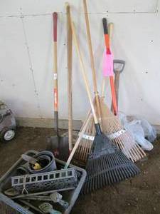 2 metal rakes, 2 leaf rakes, 2 shov...