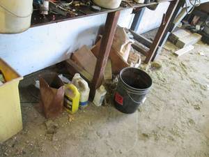 Contents of floor below the benches...