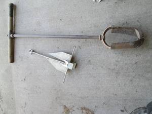 Vintage post hole digger and anchor...