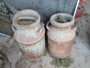2 vintage milk cans...