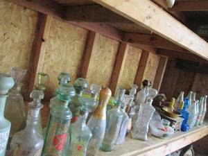 Shelf of contents includes vintage ...
