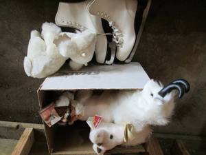 Box of stuffed animals and pair of ...