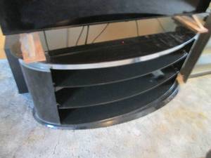 Large swiveling TV stand with glass...