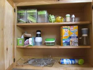 Contents of cupboard includes Vidal...