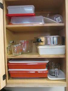 Contents of cupboard includes Pyrex...