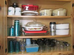 Contents of cupboard includes glass...