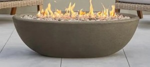 lot 400 image: Real Flame Riverside 48 in. x 15 in. Oval MGO Propane Fire Pit in Glacier Gray - Unclaimed Freight - Opened for Photos and inspection.