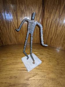lot 125 image: Abstract Metal Figure on Stone Base