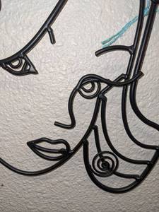 lot 261 image: Black Metal Girls Face Wall Hanging