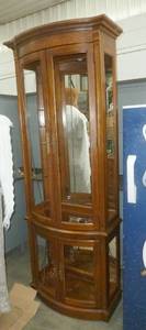 Beautiful curio cabinet with rounded glass front