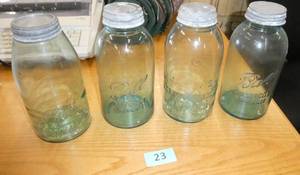 4 very nice 2 quart Ball jars - blue, some have bubbles in the glass, all with good antique lids, one glass, no chips or cracks seen in any of the jars