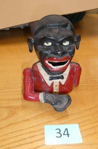 Cast iron black americana mechanical bank