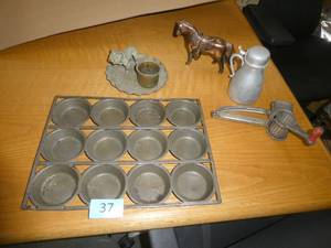 Cast iron muffin pan, aluminum creamer with lid, bulldog inkwell
