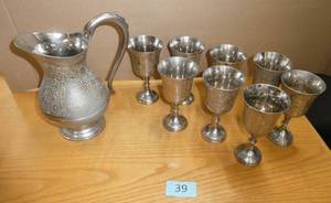 Set of silver goblets and pitcher