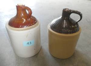 2 whiskey jugs