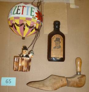 A unique hot air balloon wall decoration, W.C.Fields cologne and shoe stretcher