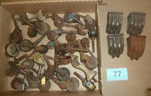 Group of vintage furniture wheels and a set of claw feet