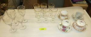 Large group of wine glasses and tea cups - there are actually 6 of the grape pattern glasses and 8 of the gold rimmed