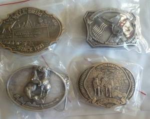 FOUR Belt Buckles - Wall Drug, Fighting Stallions, USCanada Peace Gardens, ND Centennial