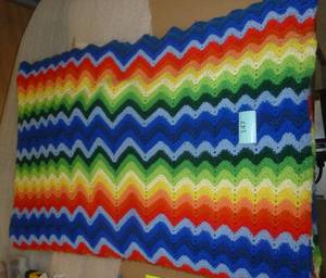 Very nice condition handmade knit afghan measures 65x72, no stains or damage