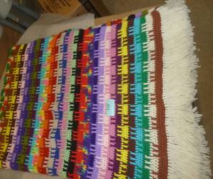 New unused handmade knit afghan measures 48x64