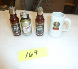 3 like new Miller cigarette lighters and a Jagermeister shot glass