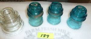 4 Hemingray insulators in good shape, no chips, one does have a crack