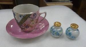 Moustache cup and a set of salt and pepper shakers