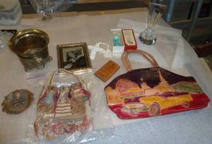 vintage collection of items including a leather worlds fair purse