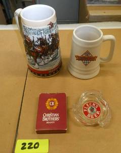 Budweiser and Jagermeister tankard mugs, Flecks beer ashtray, Christian Brothers playing cards