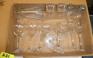 Lot of wine glasses, a pair of neat square glasses, salt and pepper