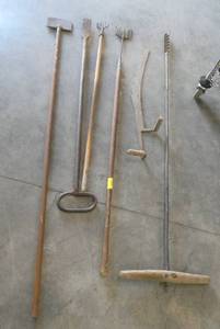Vintage fishing spears, auger, ice choppers