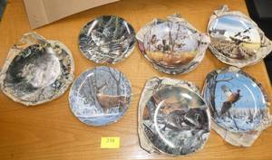 7 Collectors plates with various animals