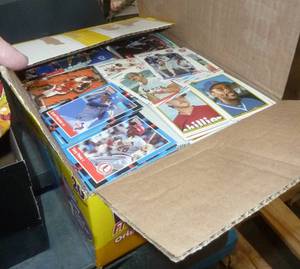 Box with hundreds of trading cards