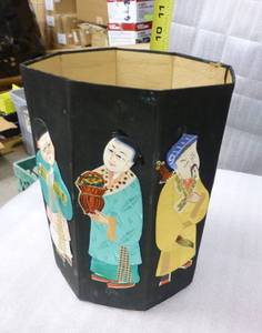 Vintage chinese box made of cardboard covered with fabric and has handmade figures of different types of fabric