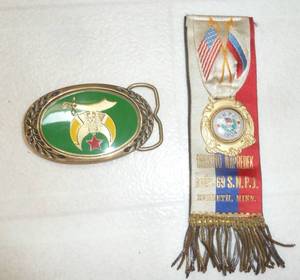 1904 ribbon and a brass buckle
