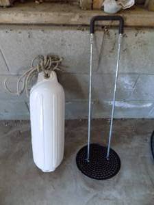 lot 70 image: Boat bumper and 9 12 hole cleaner