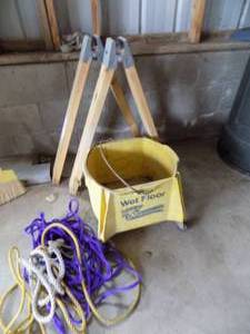 lot 106 image: Rope, sawhorse legs, mop bucket