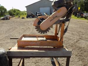 lot 142 image: Gas cement saw with stand