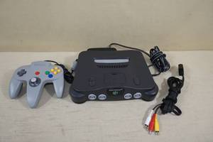 lot 238 image: Nintendo 64 Game System with Controller
