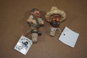 lot 87 image: Spit-n-Whittle Hand Carved Bottle Stoppers