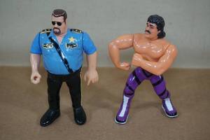 lot 105 image: 1990 Titan Sports Wrestling Action Figures - Big Boss Man, Rick Rude